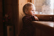 © Designpics - Portrait of Girl Looking out of Window