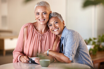 Canvas Print - Friends, coffee and portrait of senior women enjoying quality time, relaxing and bonding together in cafe. Drinking coffee, happiness and females hugging, embrace and smile in coffee shop on weekend