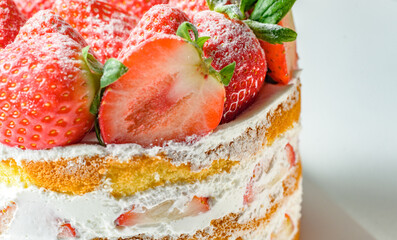 Delicious strawberry cake food with red fresh raw strawberries and white whipped cream