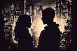 Romantic moment between teenage couple in silhouette against blur of the city at night.