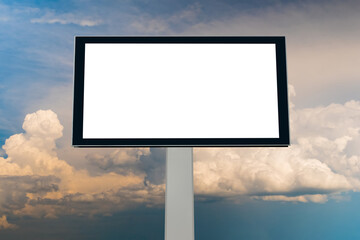 Wall Mural - blank white billboard against warm sunset sky with clouds - mock up. template, consumerism, advertis