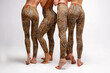 © thomsond - Group of women with different body types in leopard leggingson