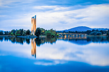 Wall Mural - Gorgeous cityscape of the National Carillon at sunset over Lake Burley Griffin, Canberra, Australia