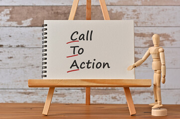 Poster - There is notebook with the word Call To Action. It is an eye-catching image.