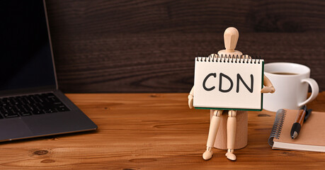 Poster - There is sketchbook with the word CDN. It is an abbreviation for Content Delivery Network as eye-catching image.