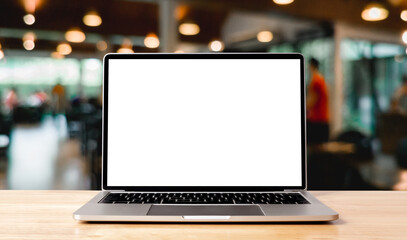 laptop blank screen on wood table with coffee cafe background, mockup, template for your text, clipp