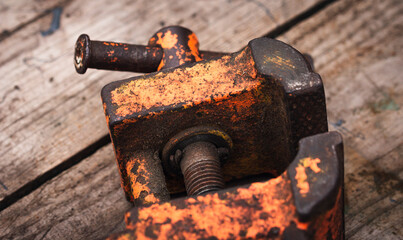 Wall Mural - Old vintage vise covered with orange paint