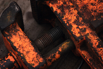 Wall Mural - Old vintage vise covered with orange paint