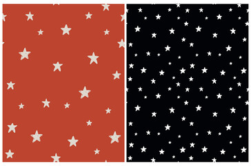 Wall Mural - Tiny Stars Seamless Vector Patterns. Irregular Hand Drawn Simple Starry Sky Print for Fabric, Textile, Wrapping Paper. Infantile Style Galaxy Design. Little Stars Isolated on a Red and Black.