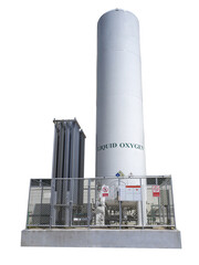 large liquid oxygen tank in hospital. liquid oxygen tank with warning label for flammable.