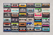colorful audio cassettes collection on grey background
