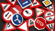 traffic sign collage with asphalt background, 3d rendering