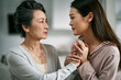 © imtmphoto - young asian daughter comforting elderly mother