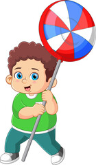 Sticker - A cute boy holding a big lollipop candy