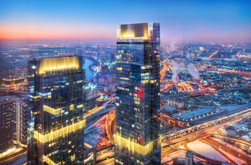 Wall Mural - View of the city from the observation deck Panorama 360 to skyscrapers in the light of night lights, Moscow City Federation Tower, Moscow