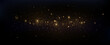 © blagorodez - Golden sequins glow with many lights. Glittering dust. Luxurious background of golden particles.