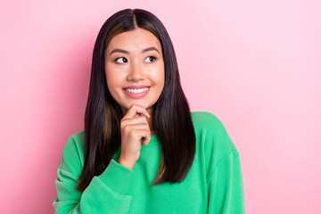 Sticker - Portrait photo of young positive satisfied japanese woman touch chin look empty space think about her future job isolated on pink color background