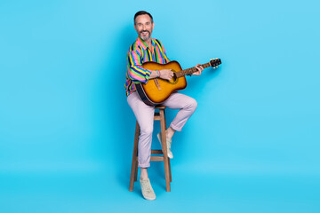 Poster - Photo of glamour talented vocalist sitting stool hobby time give concert enjoy cool time occasion isolated on blue color background