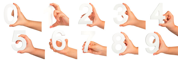 Aufkleber - Children's hands hold numbers. A set of white numbers in hands on a black isolated background. Zero, one, two, three, four, five, six, seven, eight, nine