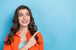 Leinwanddruck Bild - Portrait photo of young pretty brunette hair business lady pointing finger look mockup new it engineering company isolated on blue color background
