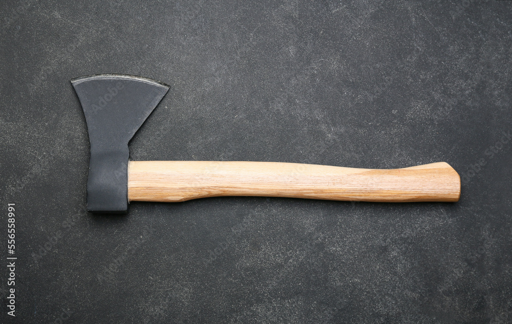 Ax on dark background, top view