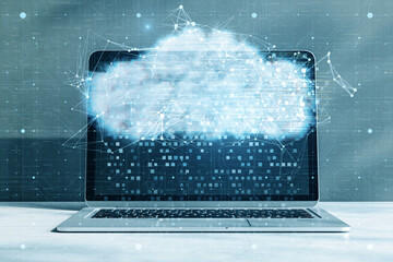 Aufkleber - Close up of laptop with digital glowing polygonal cloud mesh on blurry background. Storage technology concepts transfer data to cloud computing platforms.