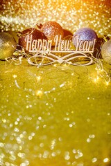 Happy New Year on a gold shiny background
