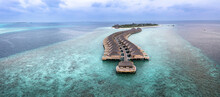 Water Bungalows At Resort On Turquoise Sea, Maldives