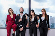 © kanpisut - Successful group of business people at modern office. Team Brainstorm Working Concept.
