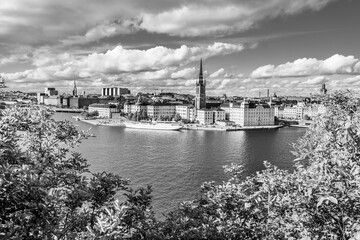 Wall Mural - Gamla Stan old town in Stockholm Sweden on Lake Malaren waterfront seen from Monteliusvagen hill