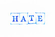 © bankrx - Blue color ink rubber stamp in word hate on white paper background