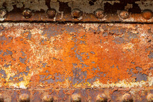 Background With Rusty Metal Beams And Powerful Rivets. Old Bridge Mounts.