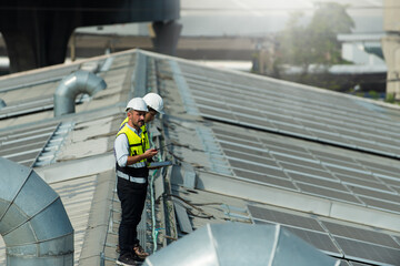 worker on the roof. worker on the roof of a building