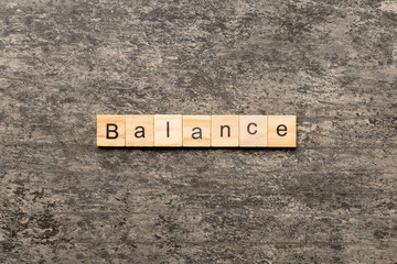 balance word written on wood block. balance text on cement table for your desing, concept