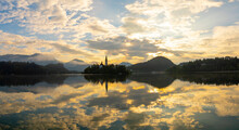 Сharm Of The Ancient Cities Of Europe. Panoramic Morning View Of Pilgrimage Church Of The Assumption Of Maria. Exciting Autumn Scene Of Bled Lake, Julian Alps, Slovenia, Europe.