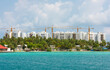 Panoramic view of large tropical island city apartments under construction
