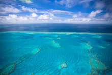 Aerial Views Over The Whitsunday Island Chain And The Great Barrier Reef; Whitsundays, Queensland, Australia