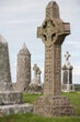 Ancient, Clonmacnoise Monastery with its burial ground of stone monuments and Celtic crosses on the banks of the River Shannon; County Offaly, Ireland
