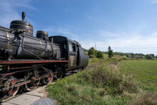Steam Train Passing Through Rural Transylvania, Romania; Transylvania, Romania