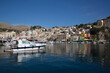 © Designpics - Cabin Cruisers and sailboats moored in the marina at Gialos Harbor, Symi (Simi) Island; Dodecanese Island Group, Greece