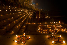 People Gather At The Ghats In Varanasi For Dev Deepawali With Candles Lit At Night In Celebration Of The The Festival Of Kartik Poornima; Varanasi, India