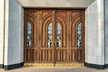 Wall Mural - Carved wooden doors with patterns and mosaics.