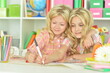 © aletia2011 - Two cute little girls drawing with pencils