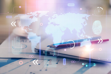 Poster - Double exposure of desktop with computer and world map hologram. International data network concept.