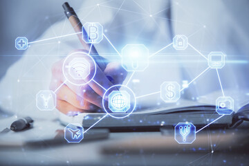 Poster - Social network theme hologram over hands taking notes background. Concept of global international people connect. Double exposure