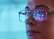© Connect Images - Scientist in glasses looking at screen