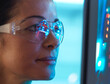 © Connect Images - Scientist in glasses looking at screen