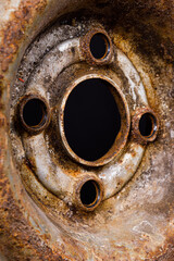 Poster - metal car rim with rust closeup. vertical frame