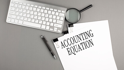 Poster - ACCOUNTING EQUATION text on paper with keyboard on grey background