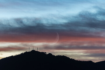 Wall Mural - Winter color sunset with crescent moon!